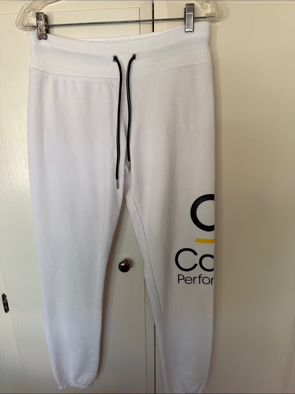 Calvin Klein Performance White Joggers with Black and Yellow Logo